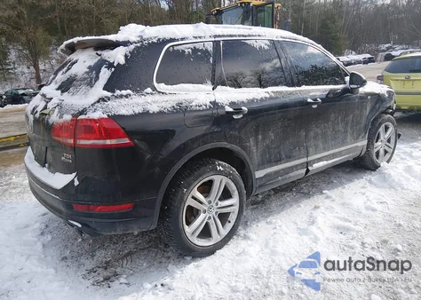 2014 Volkswagen Touareg Tdi R-Line z USA, uszkodzony, nr VIN WVGDP9BP2ED002422